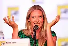 Shrugging gesture with both hands