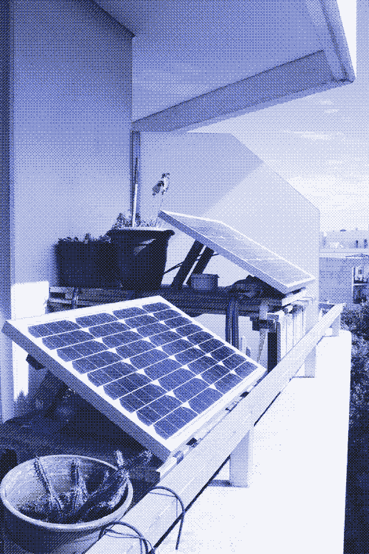 The 50W and 30W solar PV panels on the balcony. One is powering the website, the other is powering the lights in the living room. Image by Marie Verdeil.