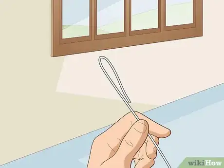 Image titled Hang Curtains with Wire Step 7