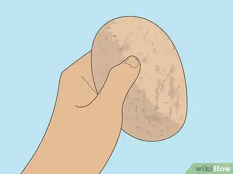 Image titled Remove a Broken Light Bulb with a Potato Step 4