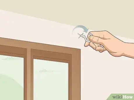 Image titled Hang Curtains with Wire Step 4