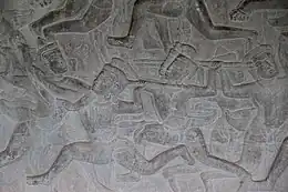 Elbow to the jaw pass the arm shield.  Bas-relief located at Angkor Wat(1100s)