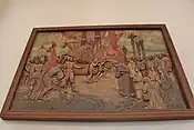 Bas-relief in painted wood depicting the first arrival of Our Lady of Peace and Good Voyage in the Philippines