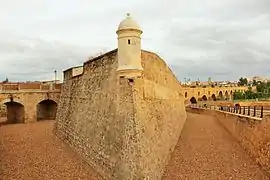Curtain walls at a very acute angle, moat and bartizan and Palmas Bridge in the background