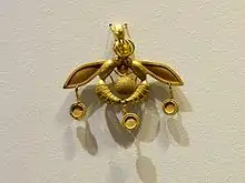 The Malia Pendant, an iconic Minoan jewel; 1700-1600 BC; gold; width: 4.6 cm; from Chrysolakkos (gold pit) complex at Malia; Archaeological Museum of Heraklion
