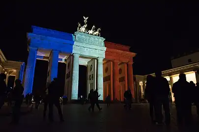 The Brandenburg Gate lit up with the colors of the French flag after the November 2015 Paris attacks