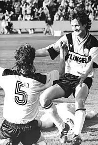 Gütschow celebrates with Steffen Büttner (number 5) during a 3–0 win against Rot-Weiß Erfurt in 1990.