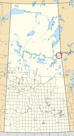 A map of the province of Saskatchewan showing 297 rural municipalities and hundreds of small Indian reserves. One is highlighted with a red circle.