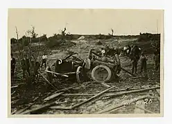 A damaged car after being thrown 200&nbsp;ft (61&nbsp;m) by the tornado