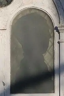 Silhouette in the likeness of Jean-Baptiste Moreau, St. Paul's Church (Halifax), Nova Scotia. Created by the Halifax Explosion