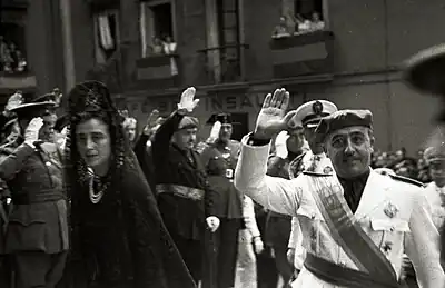 Franco in Carlist bereticonic part of the Carlist gear, a red beret, was officially declared part of the FET uniform in 1937. A governmental decree replaced it with a peaked cap in 1939