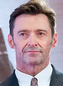 Jackman looking toward a camera