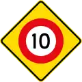 (W10-3) 10&nbsp;km/h speed limit ahead