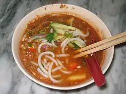 Image 80A bowl of Asam laksa (from Malaysian cuisine)