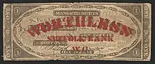 Massachusetts one dollar bill. Bill has been stenciled in red ink with the statement: "WORTHLESS: SUFFOLK BANK W. G.".