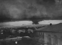 Elevated photograph of a distant tornado