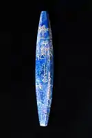 The lapis lazuli bead from Mari, with the inscription by Mesannepada, son of Meskalamdug. National Museum of Damascus, Syria.