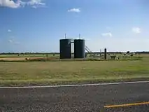 Oil well is one of several along FM 961. This lease is 1.2 miles northwest of Future I-69/US 59.