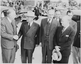Secretary of Defense George C. Marshall greeting President Truman following Truman's return from the Wake Island Conference at Washington National Airport, 18 October 1950.