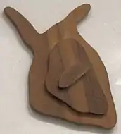 Arp, 1943: 'Impish Fruit', wood (walnut) relief