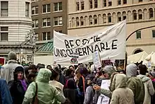 a banner marked "become ungovernable"
