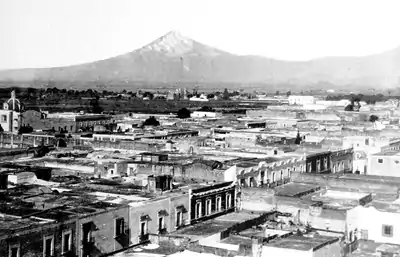 11b-VIEW OF PUEBLA SHOWING MOUNT POPOCATEPETL.png
