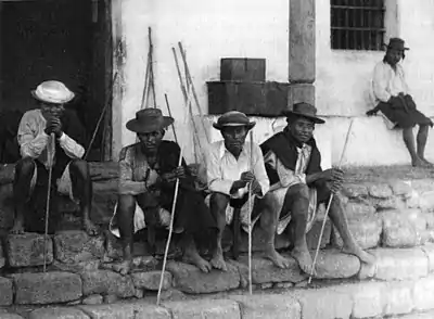 A glimpse of Guatemala - On the steps of the Cabildo, Atitlan.jpg