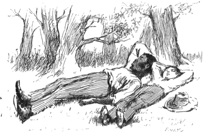 man and boy sleeping on grass