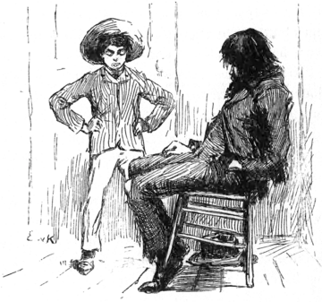 man in chair, boy standing with hands on hips