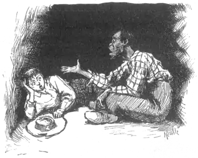 man and boy talking in cave