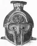 EB1911 Ceramics Fig. 58.—VASE OF 6th CENT. B.C., IN FORM OF HELMETED HEAD.jpg