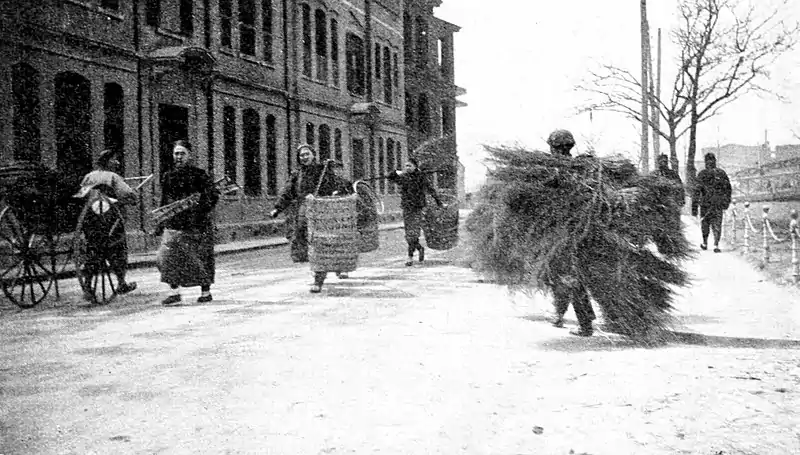 Farmers of forty centuries - Rice straw fuel being conveyed.jpg