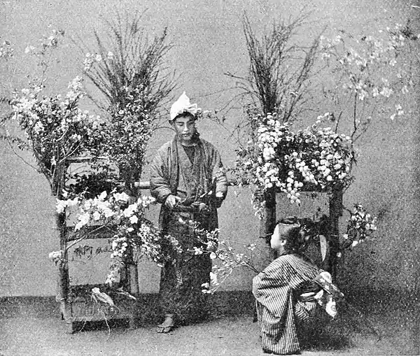 Farmers of forty centuries - Street flower-vendor, Japan.jpg