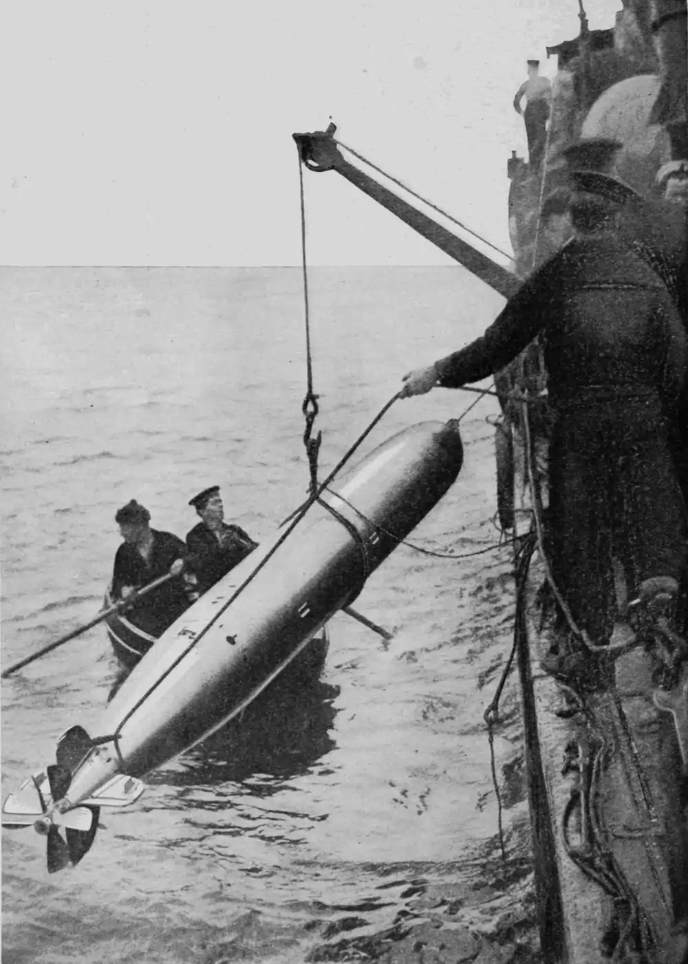 image of getting a torpedo out of sea
