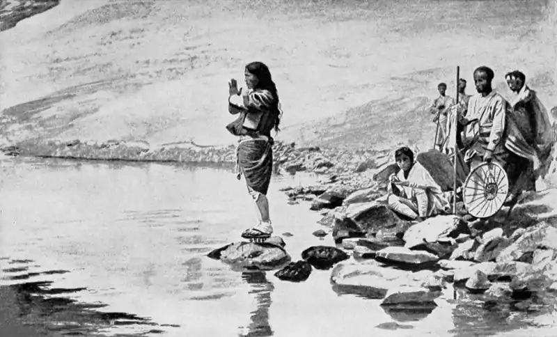 The leader of a pilgrim band blessing the holy water.png