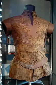 A padded jacket under glass